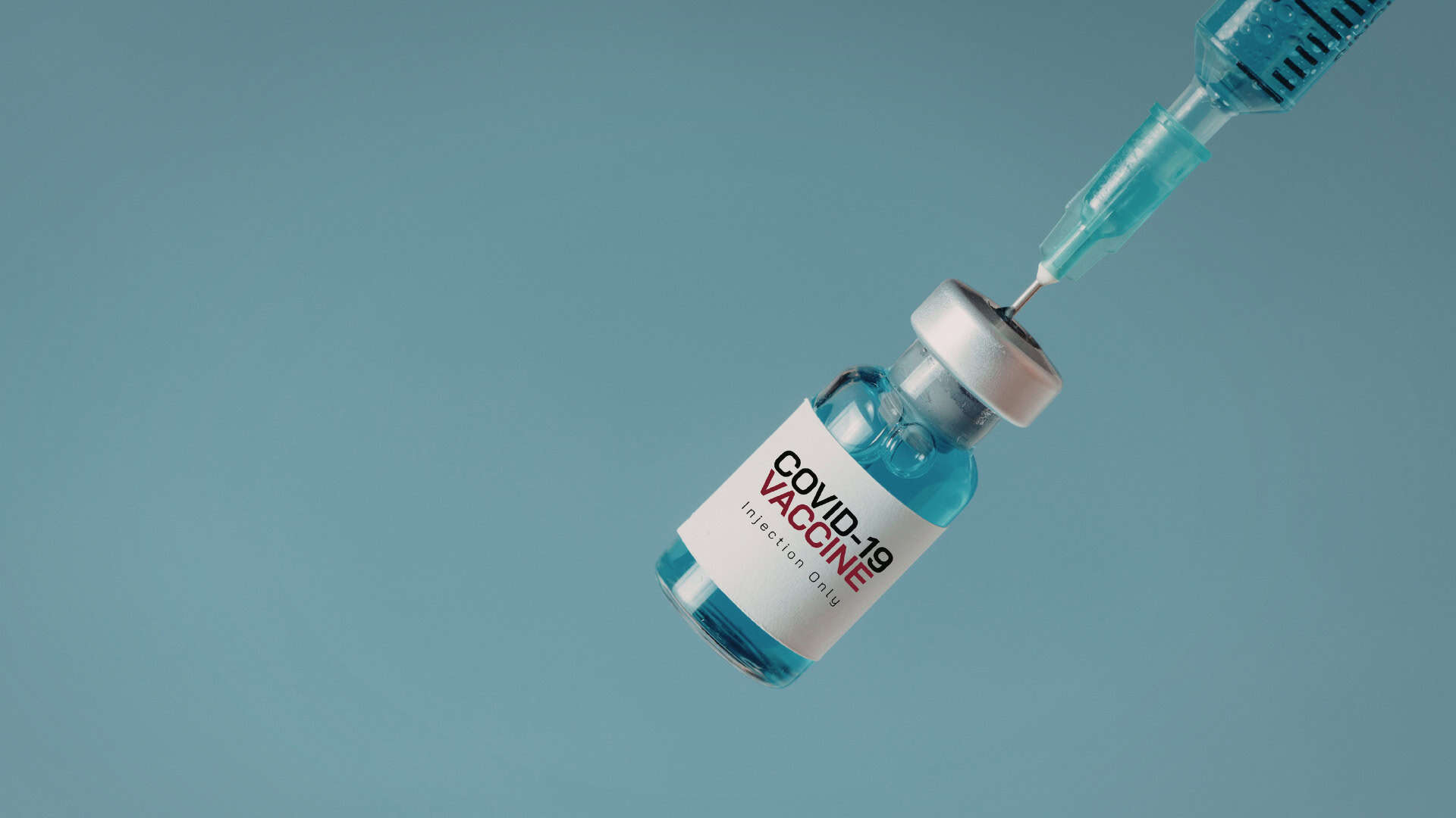 COVID-19疫苗(Canva示意圖)